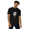 Black Front View of ANCIENT TRIBAL CAVEMAN Premium Heavyweight T-Shirt on Model