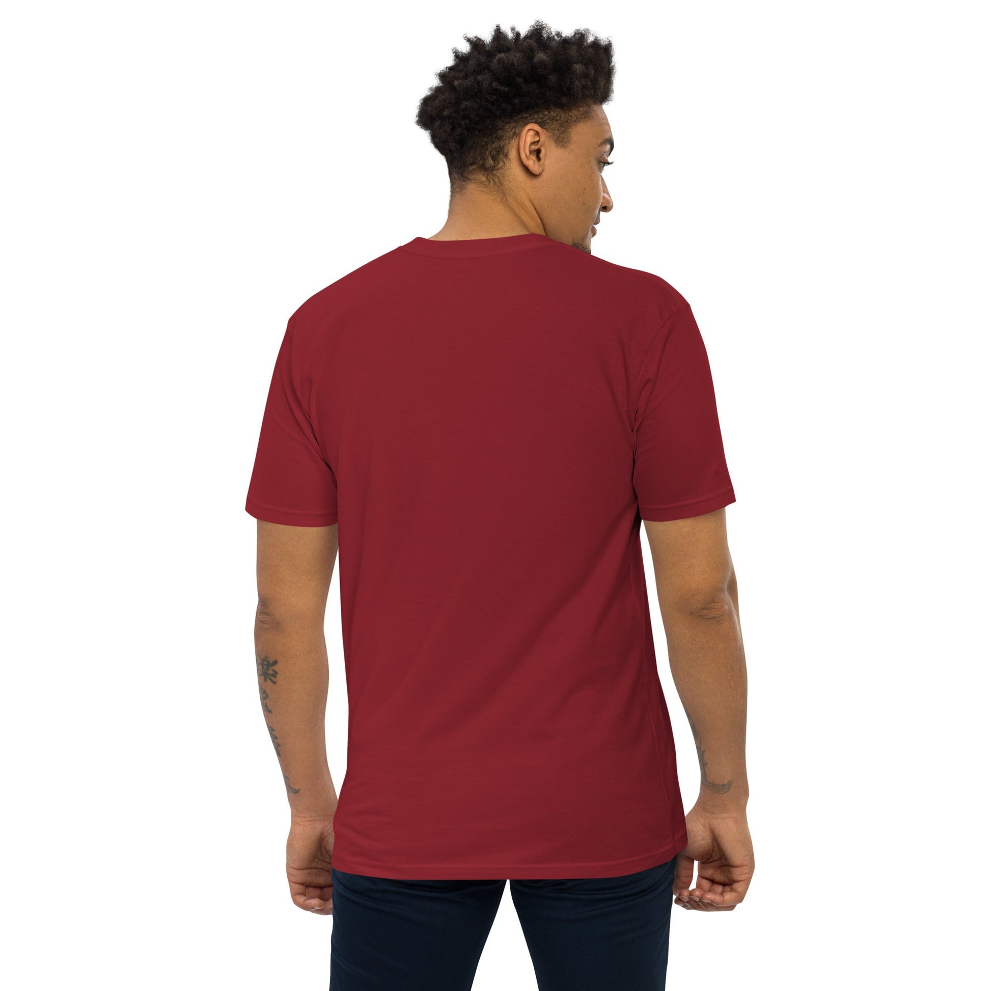 Brick Red back View of ANCIENT TRIBAL CAVEMAN Premium Heavyweight T-Shirt on Model