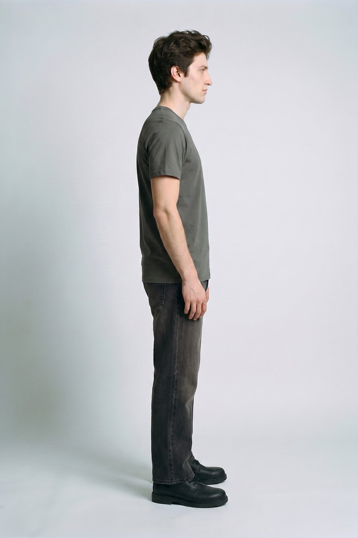 Charcoal male model side view — RARILETO Left Logo Classic Tee