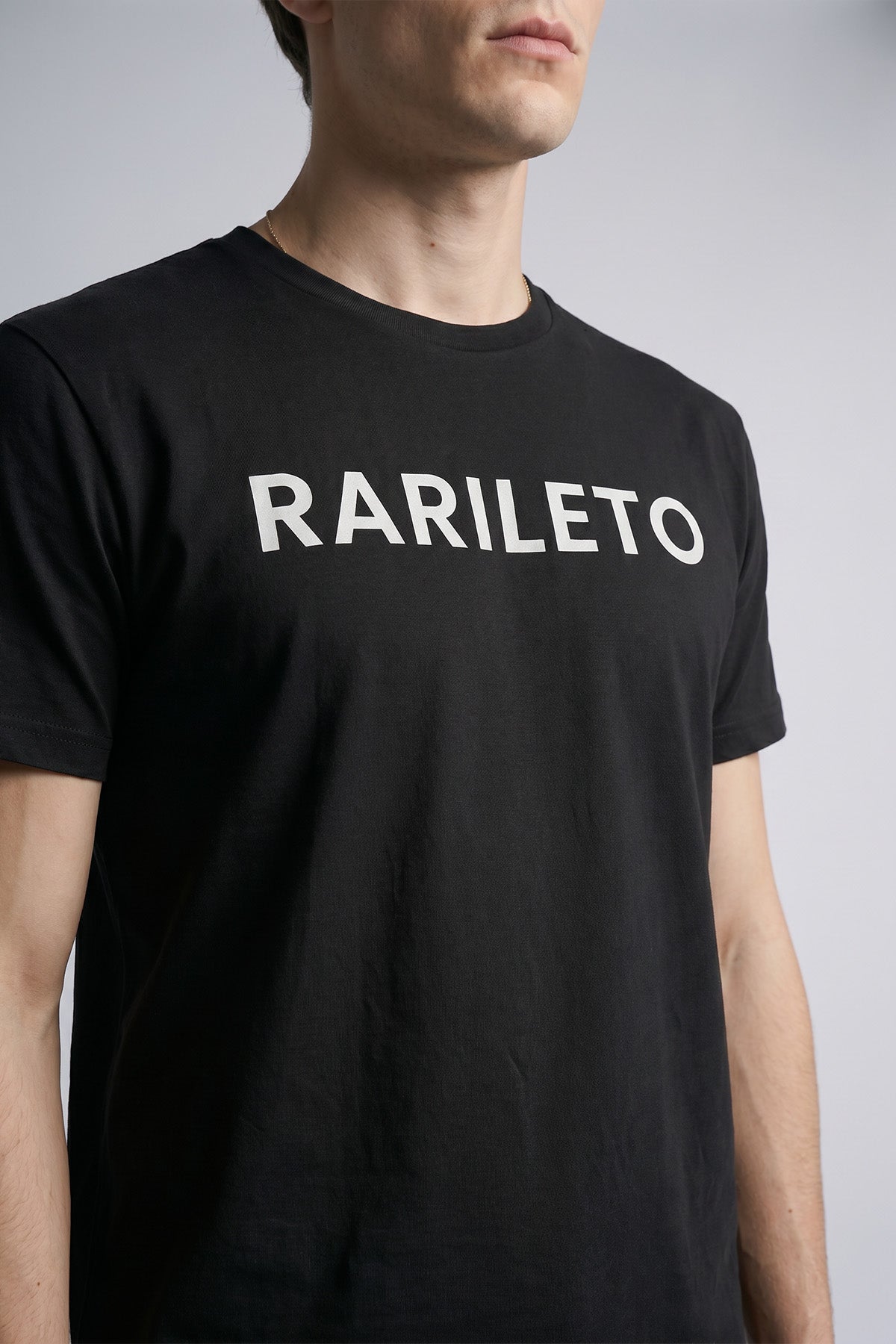 Black close-up graphic print detail — RARILETO Logo Classic Tee
