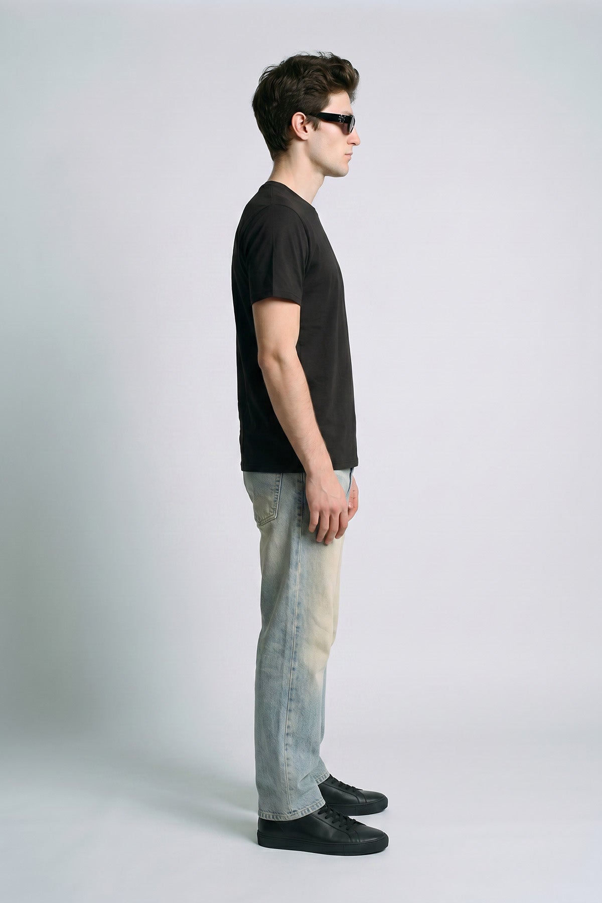 Black male model side view — RARILETO Left Logo Classic Tee