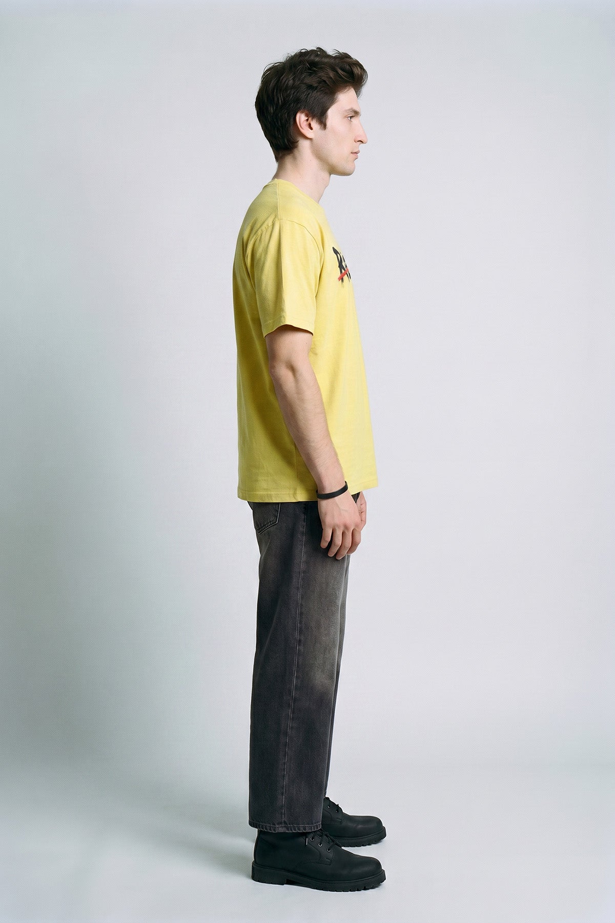 Lemon male model side view — RARILETO Brushed Stroke Logo Classic Tee
