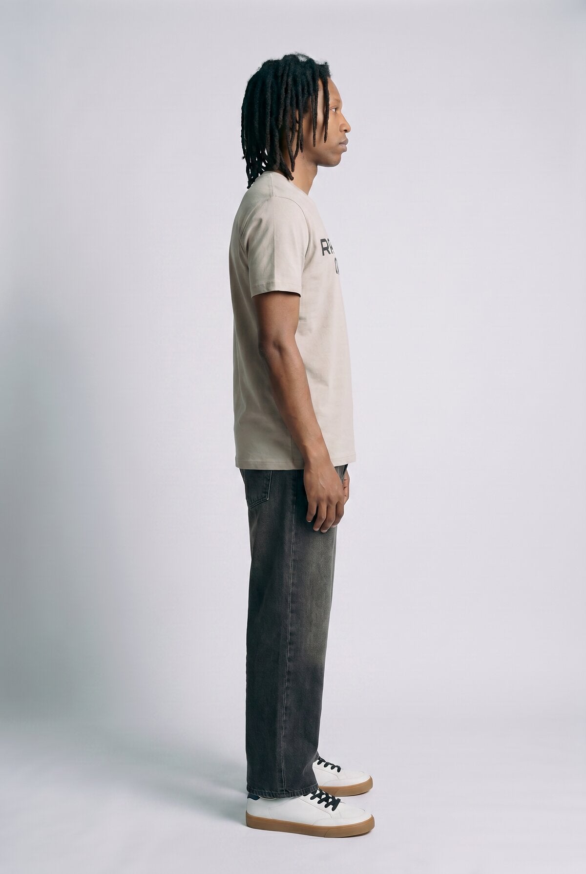 Bone male model side view — RARILETO Origin Classic Tee