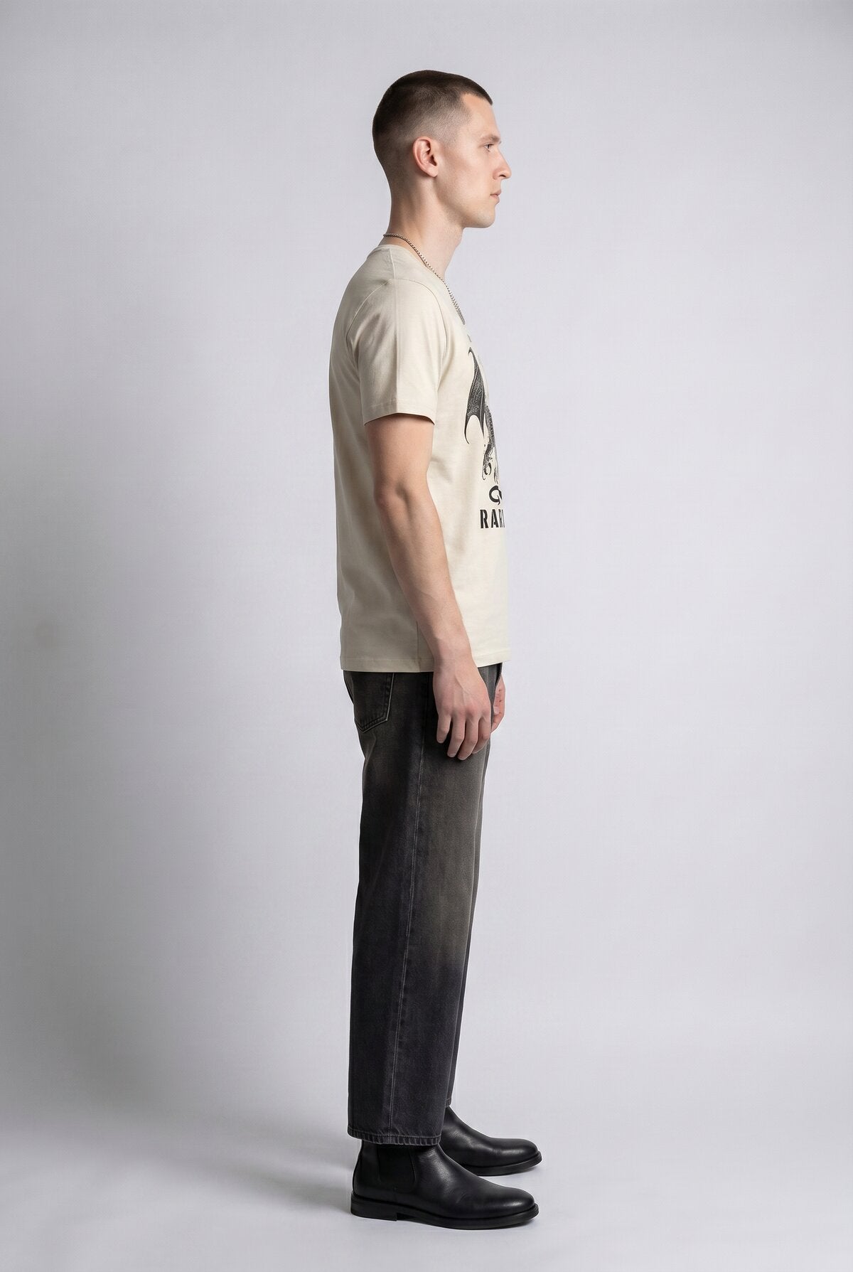 Natural male model side view — RARILETO Drago Classic Tee
