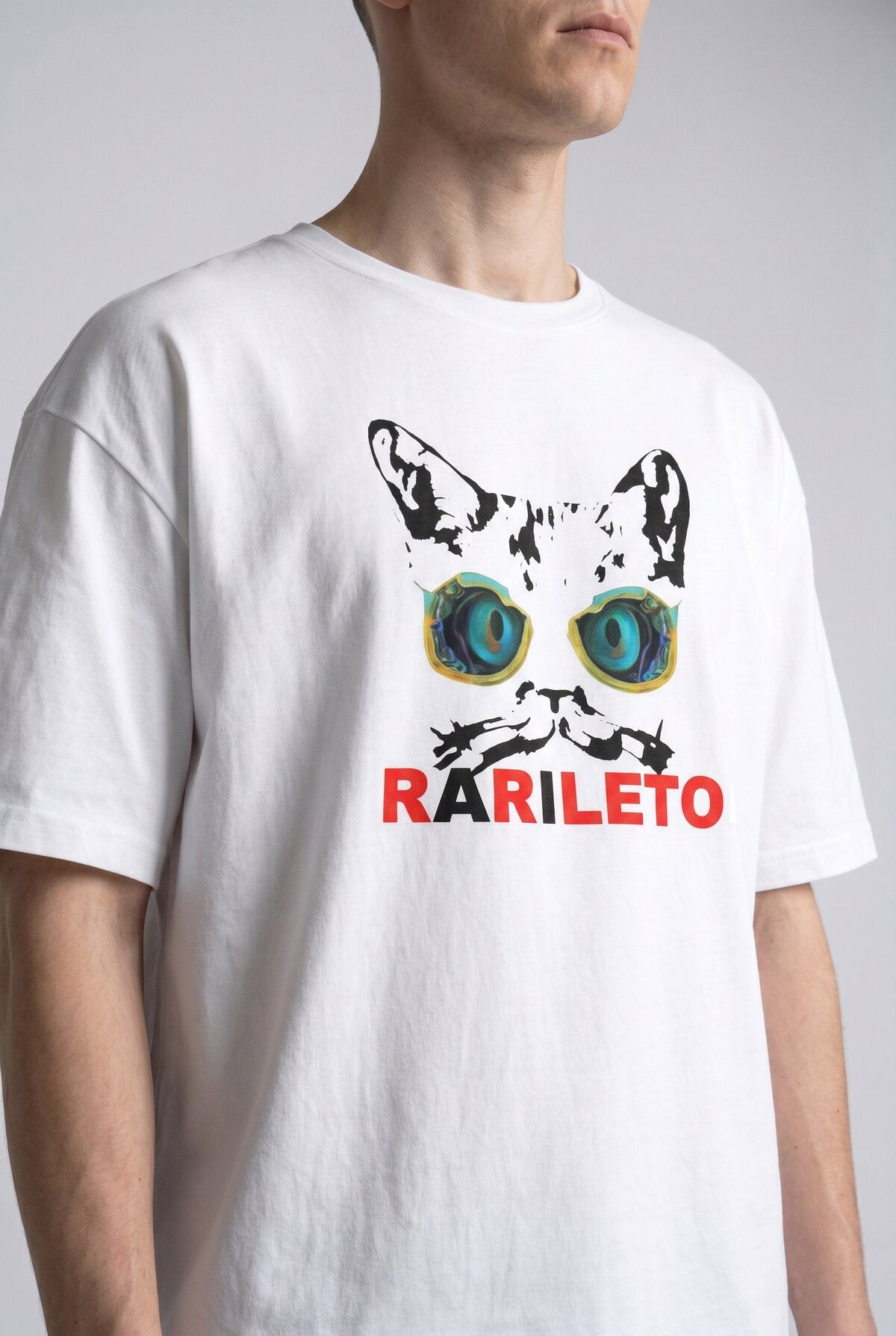 White close-up graphic print detail — RARILETO Cat Eyes Classic Tee