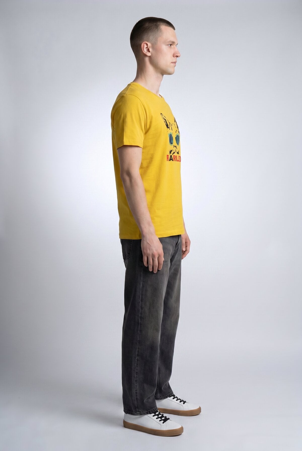 Yellow male model side view — RARILETO Cat Eyes Classic Tee