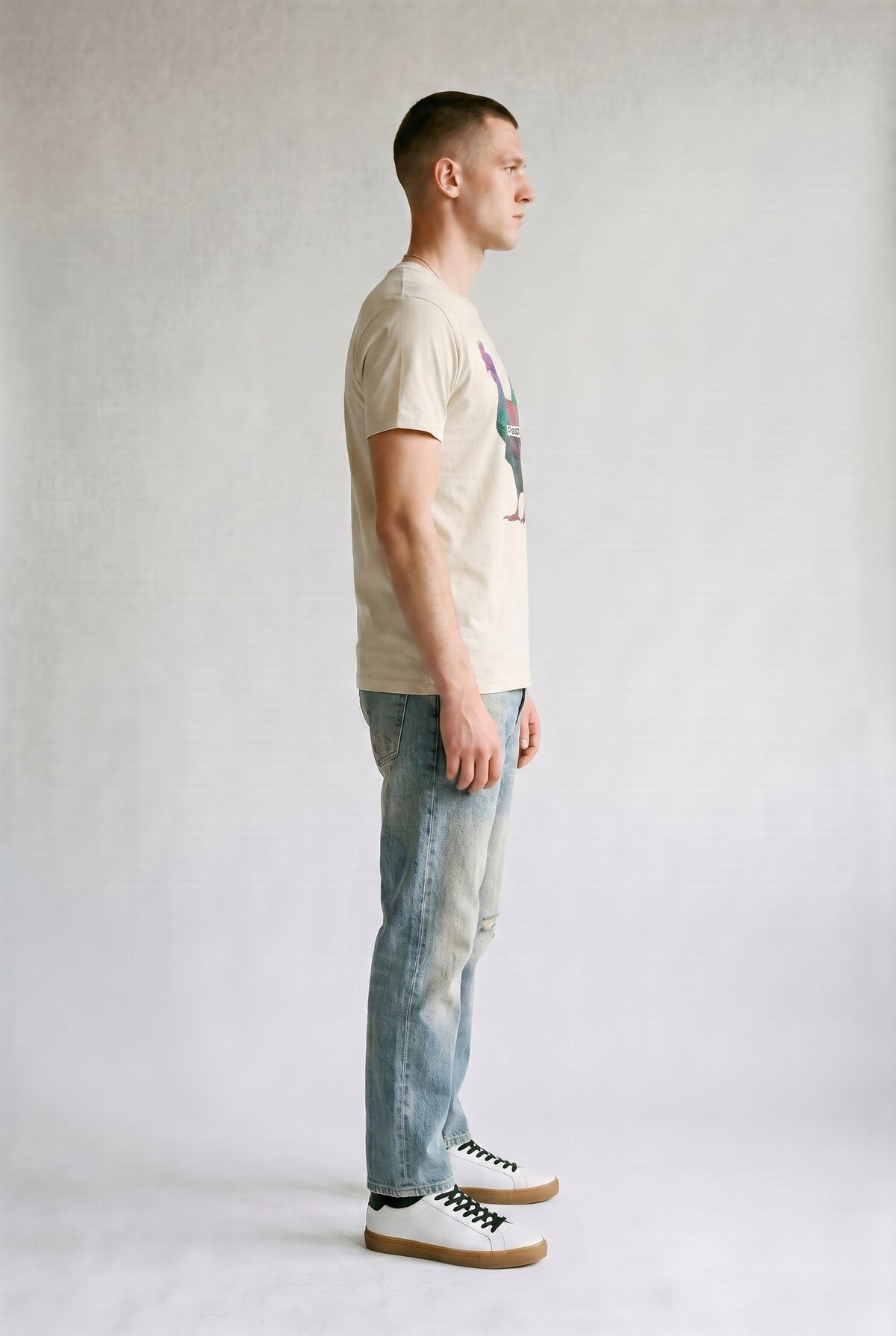 Natural male model side view — RARILETO Chicken Classic Tee