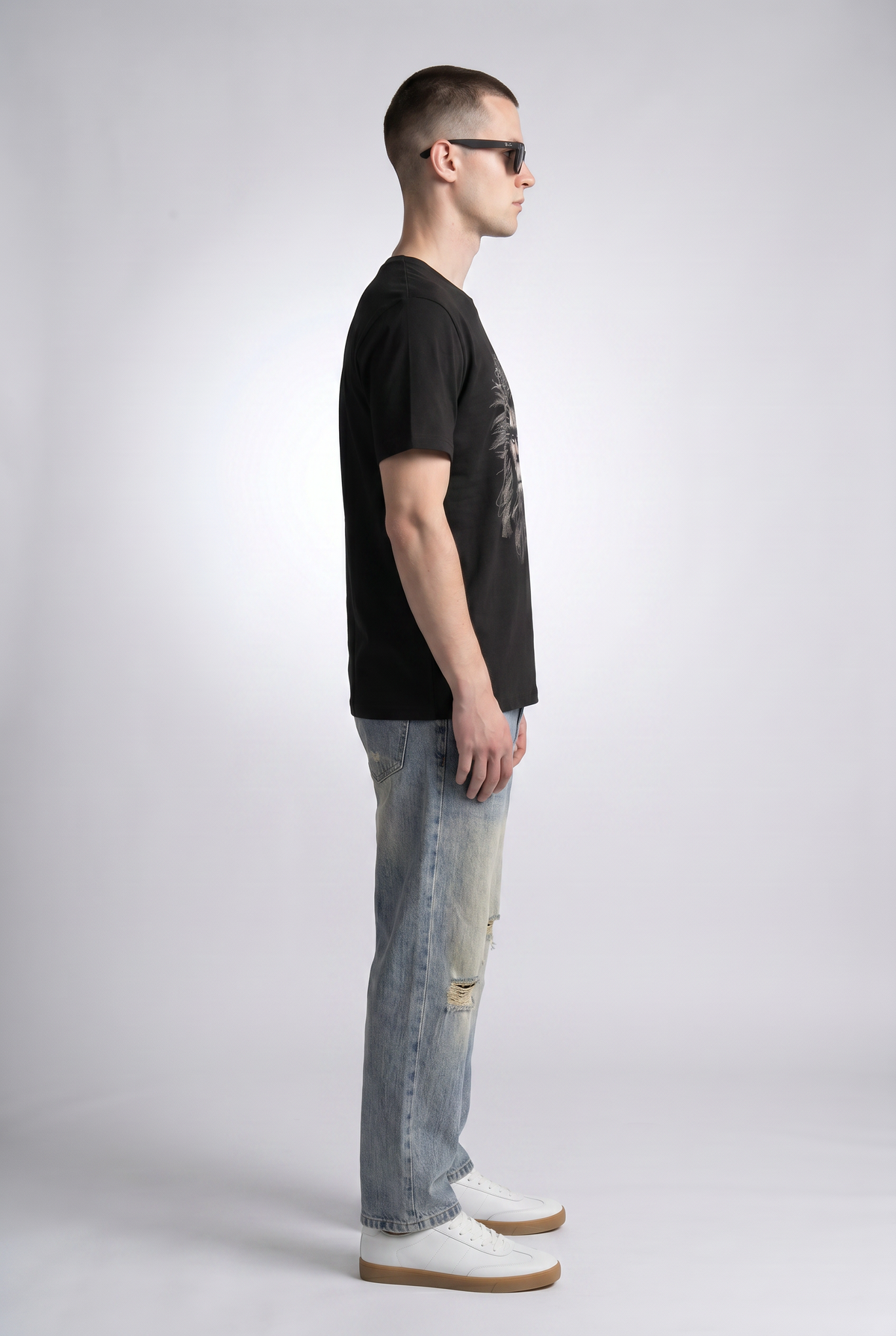 Black male model side view — RARILETO Caveman Classic Tee