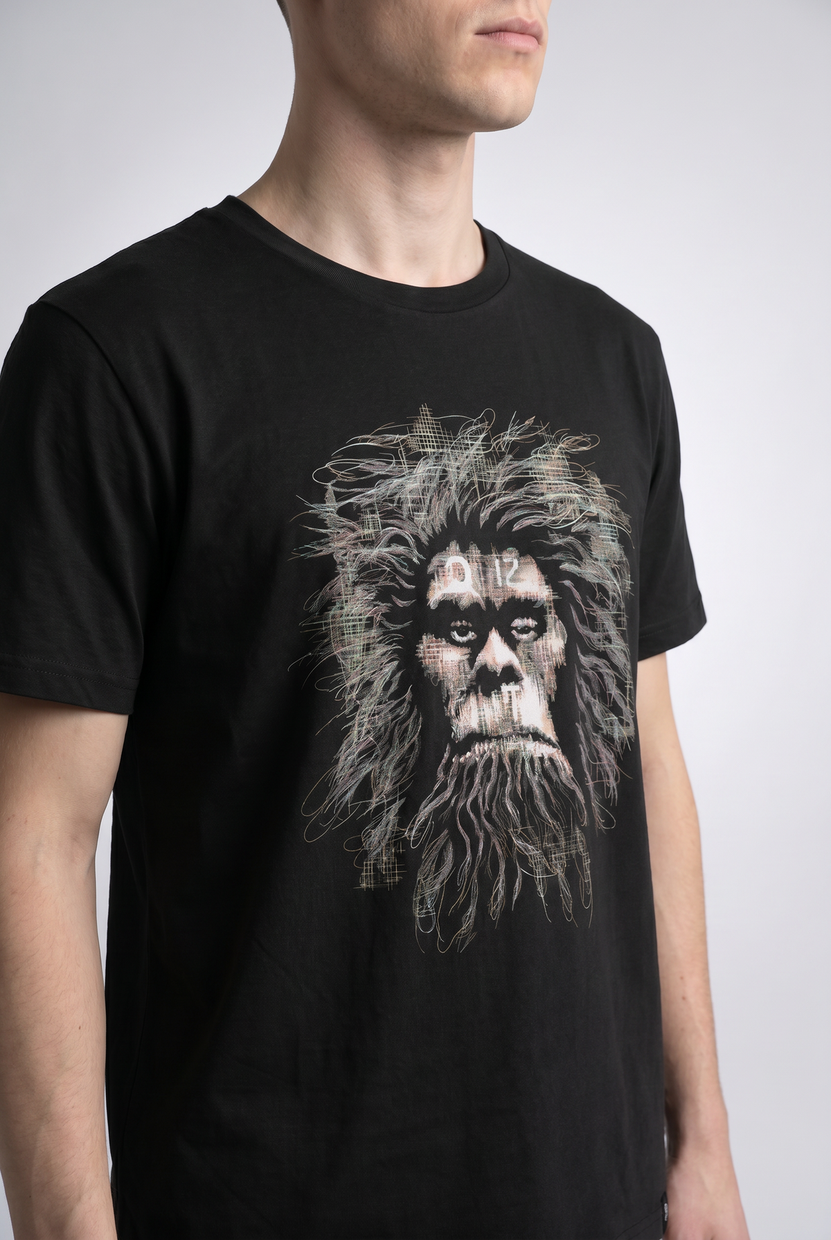 Black close-up graphic print detail — RARILETO Caveman Classic Tee