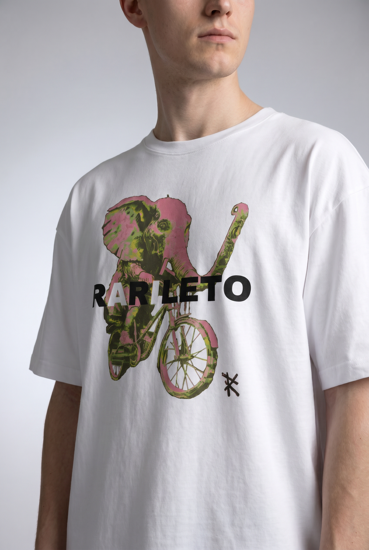White close-up graphic print detail — RARILETO Elephant Classic Tee