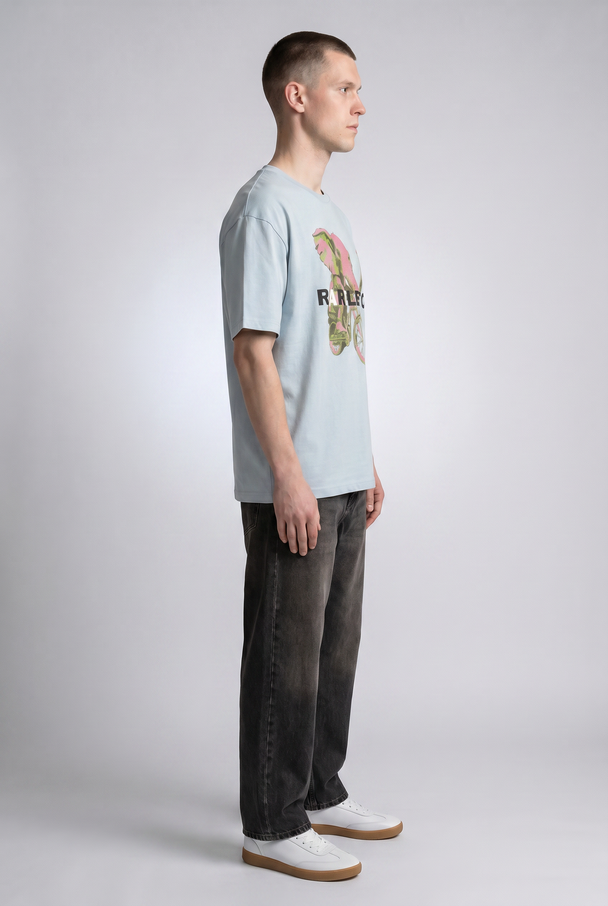 Pale Blue male model side view — RARILETO Elephant Classic Tee