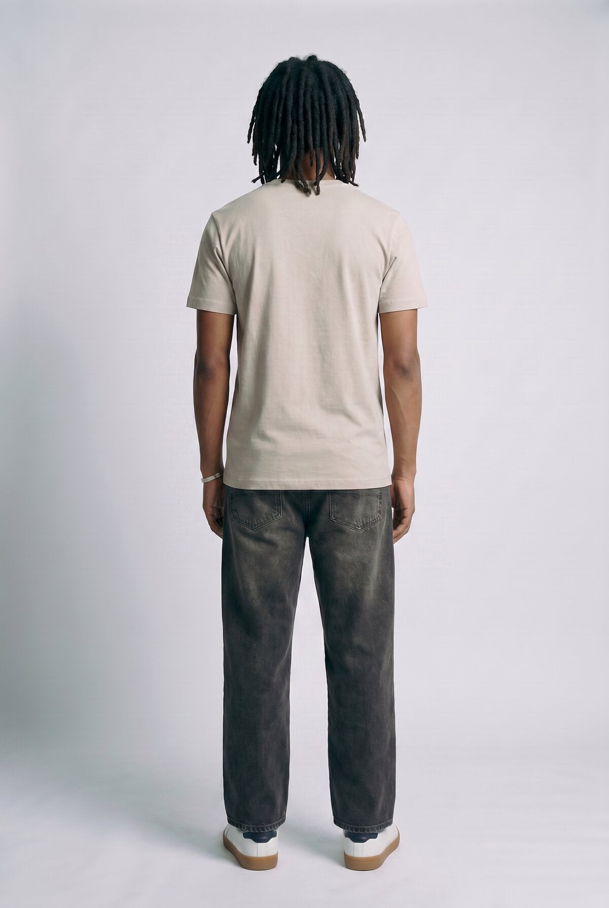 Bone male model back view — RARILETO Origin Classic Tee
