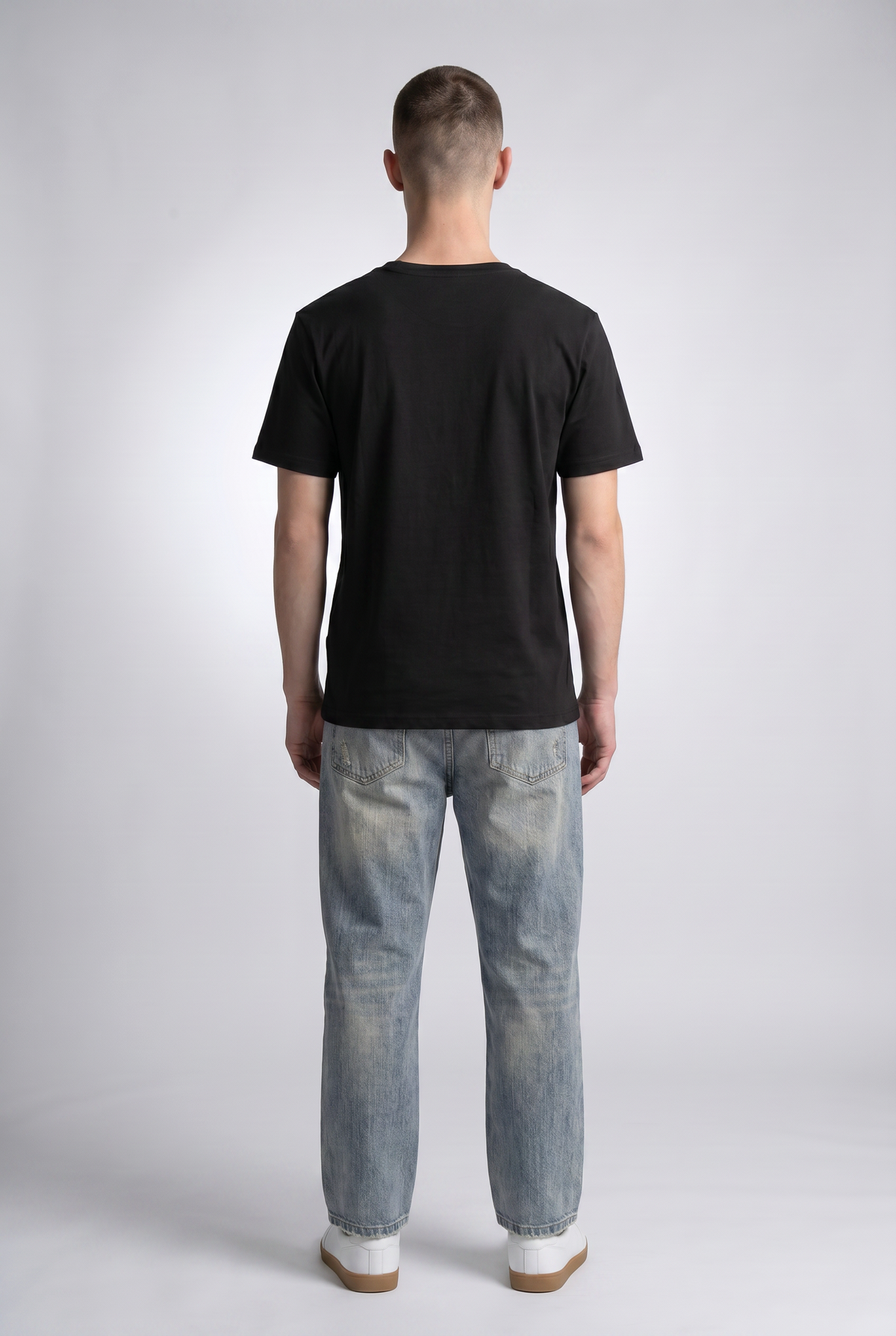 Black male model back view — RARILETO Caveman Classic Tee