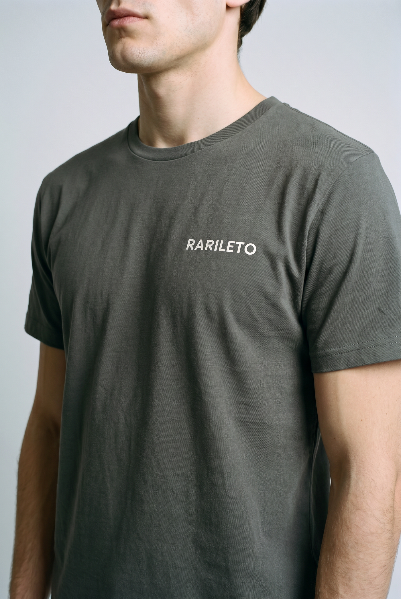 Charcoal close-up graphic print detail — RARILETO Left Logo Classic Tee