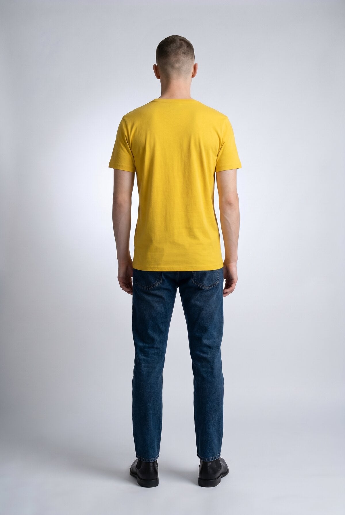 Yellow male model back view — RARILETO Cat Eyes Classic Tee