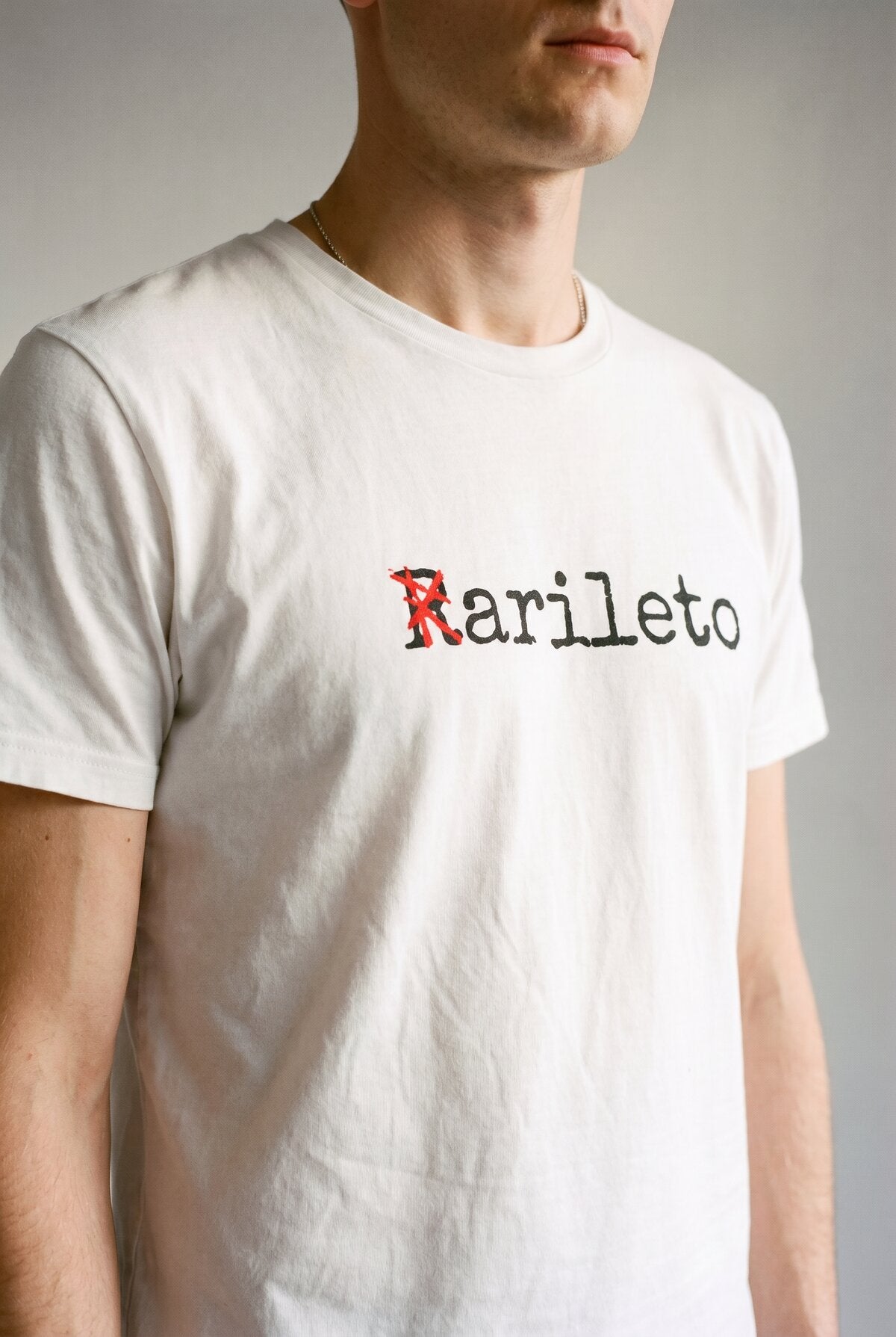 White close-up graphic print detail — RARILETO Special Classic Tee