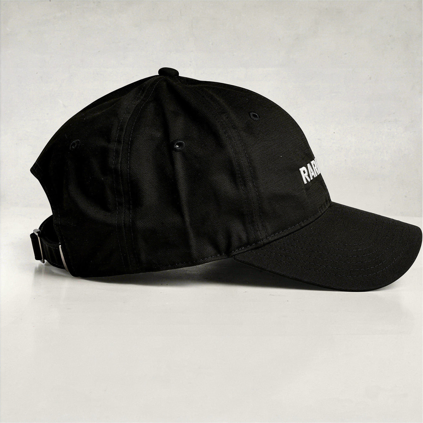 Black cap design close up RARILETO Wordmark Cap — Unstructured Strapback