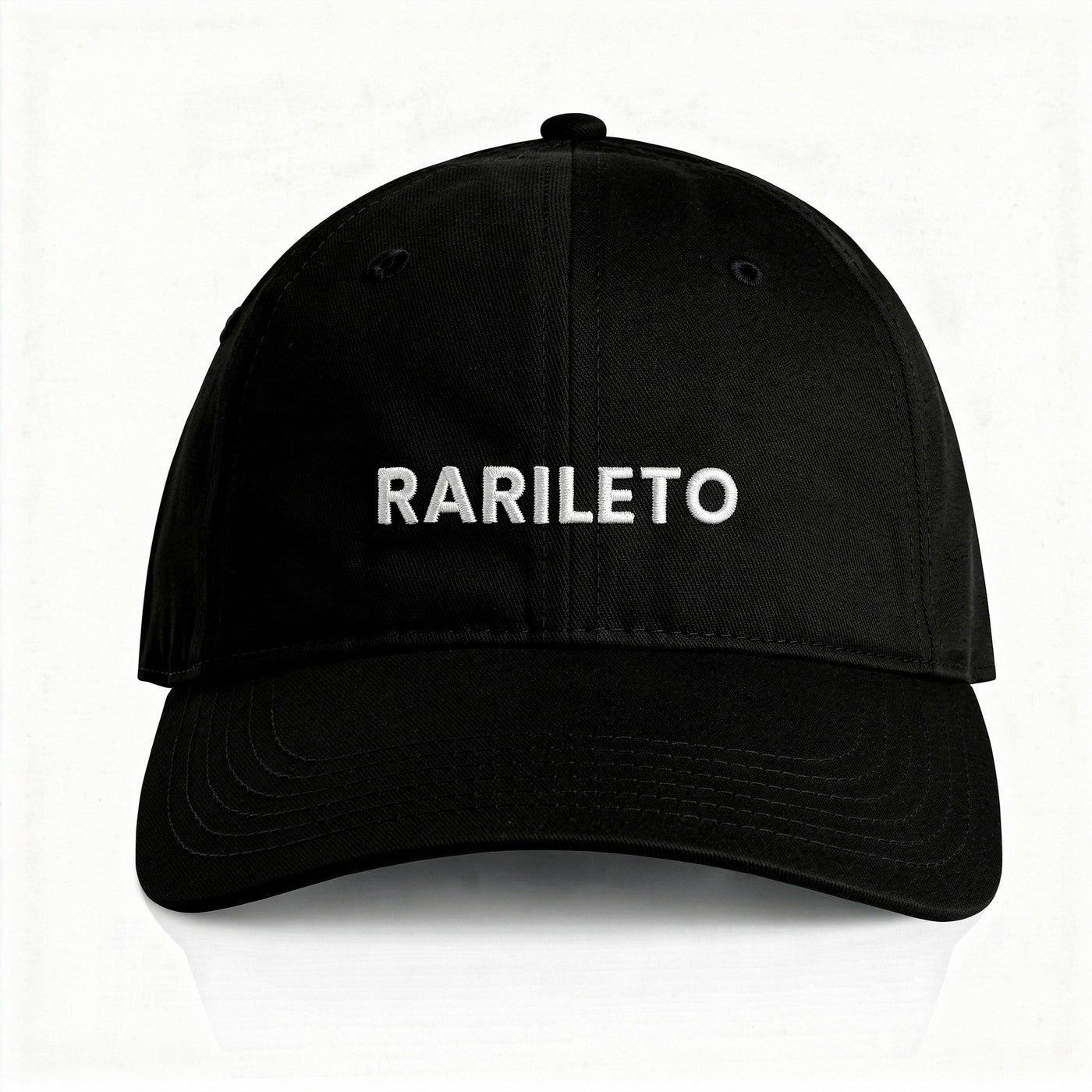 Black cap front view RARILETO Wordmark Cap — Unstructured Strapback