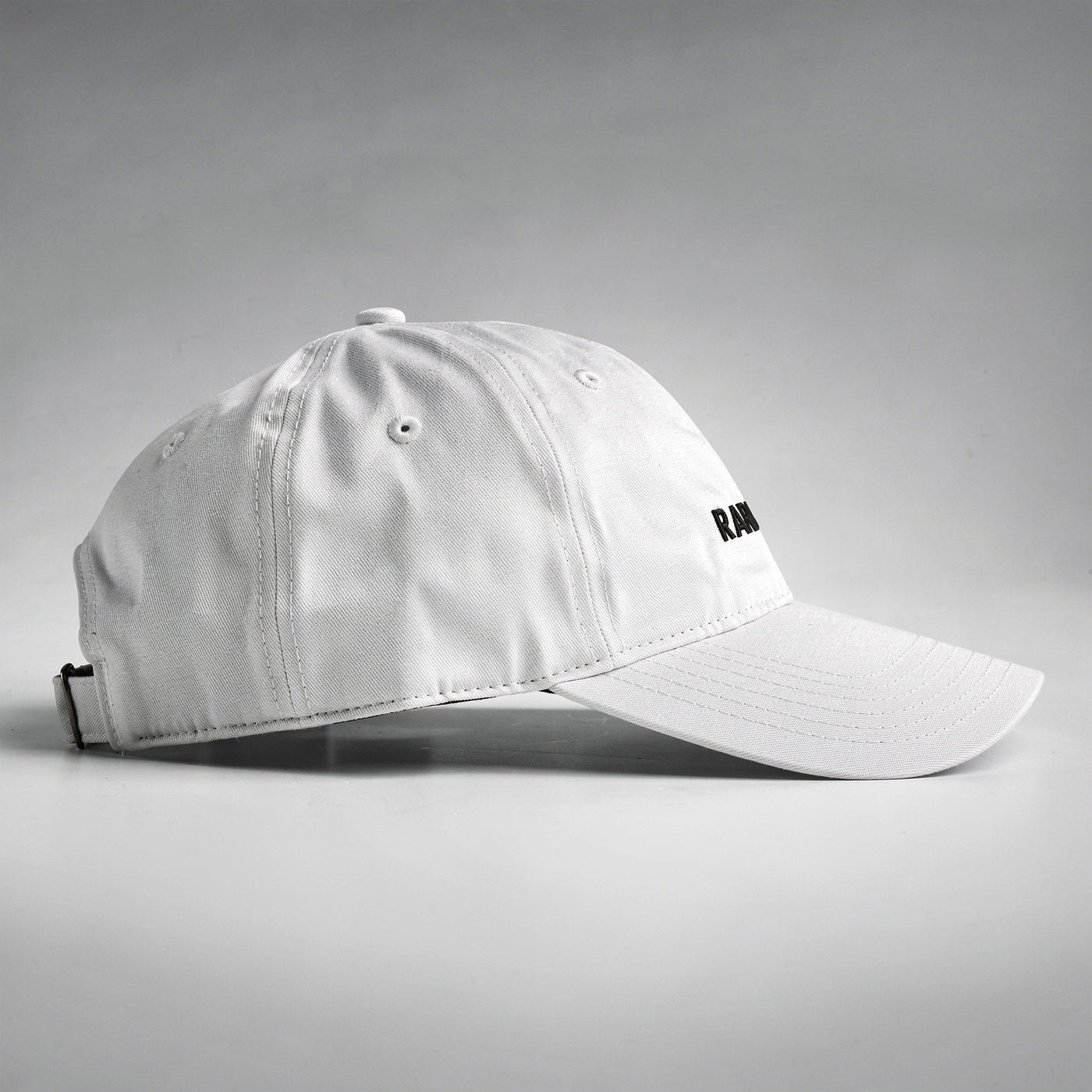 White cap design close up RARILETO Wordmark Cap — Unstructured Strapback