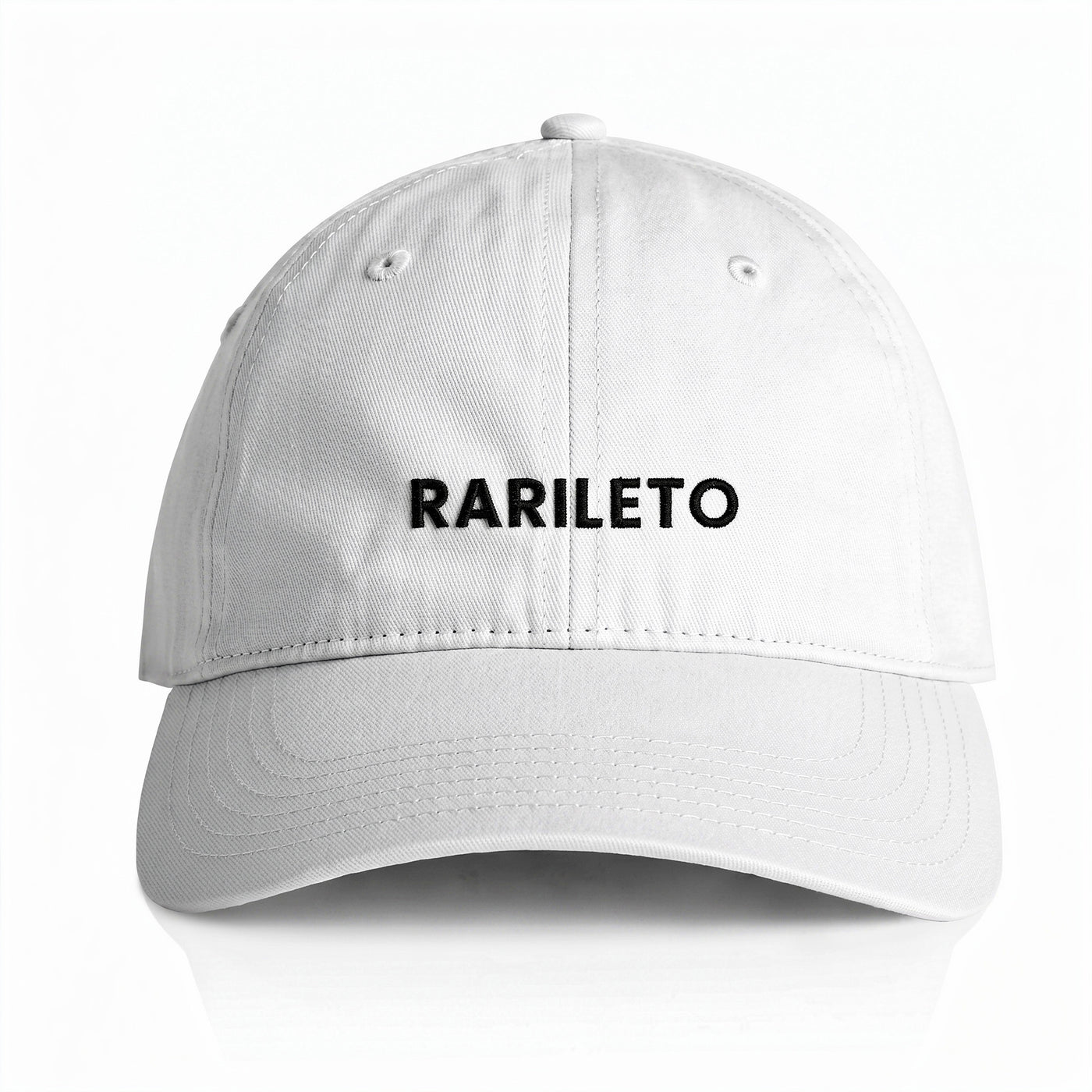 White cap front view RARILETO Wordmark Cap — Unstructured Strapback
