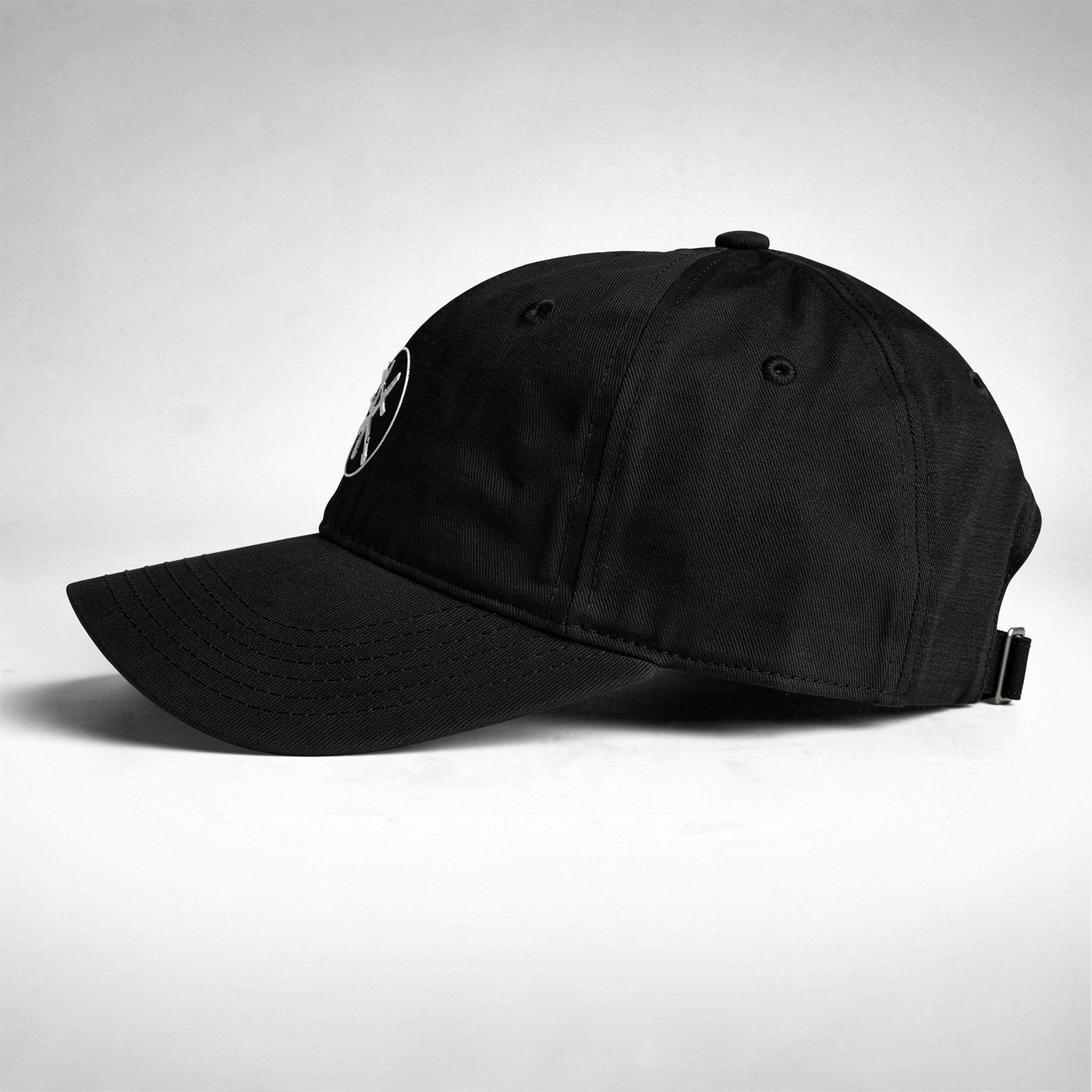 Black cap design close up RARILETO Emblem Cap — Unstructured Strapback