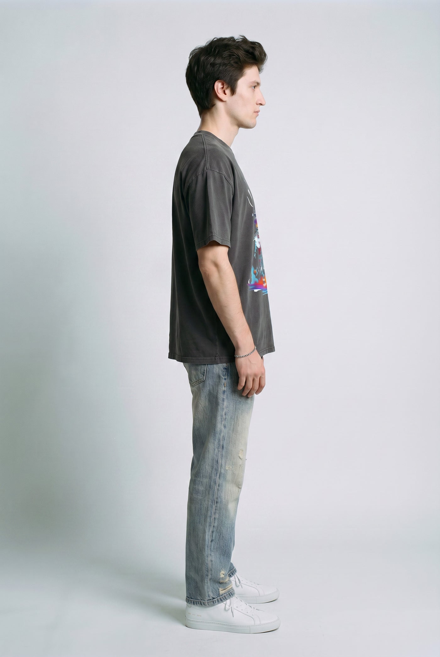 Retro Black male model side view — RARILETO Duo Bizarre Stone Wash Classic Tee