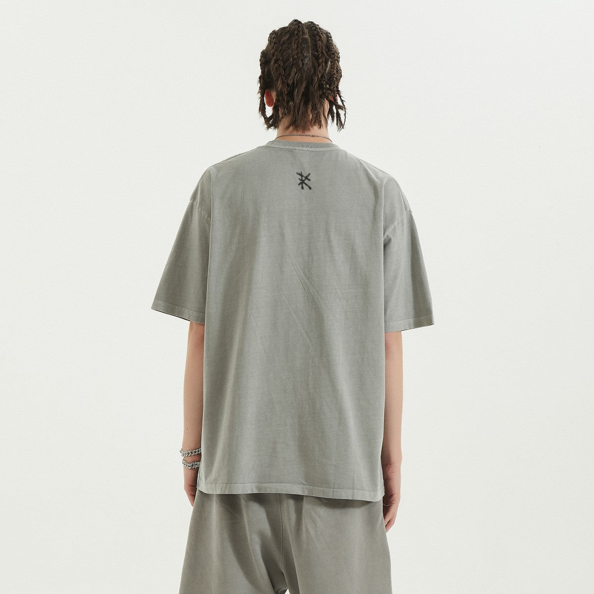 THE PRIME Unisex Washed T-Shirt in Light Gray - Rarileto - Back View on Model