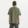 THE PRIME Unisex Washed T-Shirt in Sage Green - Rarileto - Back View on Model